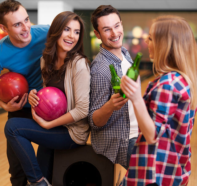 group of adults bowling at king's entertainment