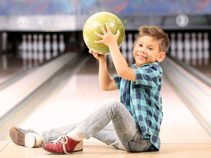 little boy bowling at king's entertainment