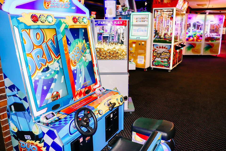 driving arcade game with bright colors at king's entertainment 